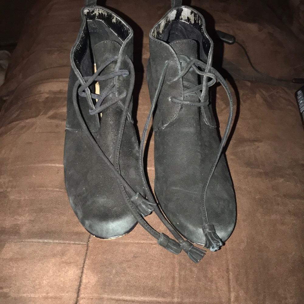 Slightly worn size 8.5 boots